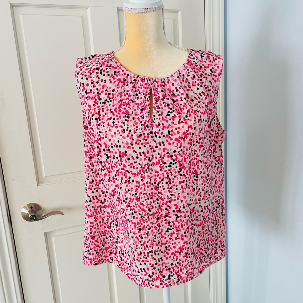 Adorable Nine West Sleeveless Blouse pairs perfectly with a Black Jacket!
